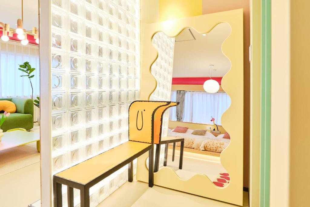 Postel nebo postele na pokoji v ubytování 寅ホテル 御徒町 TORA HOTEL Okachimachi