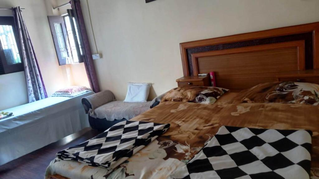 Postel nebo postele na pokoji v ubytování Mother Hostel