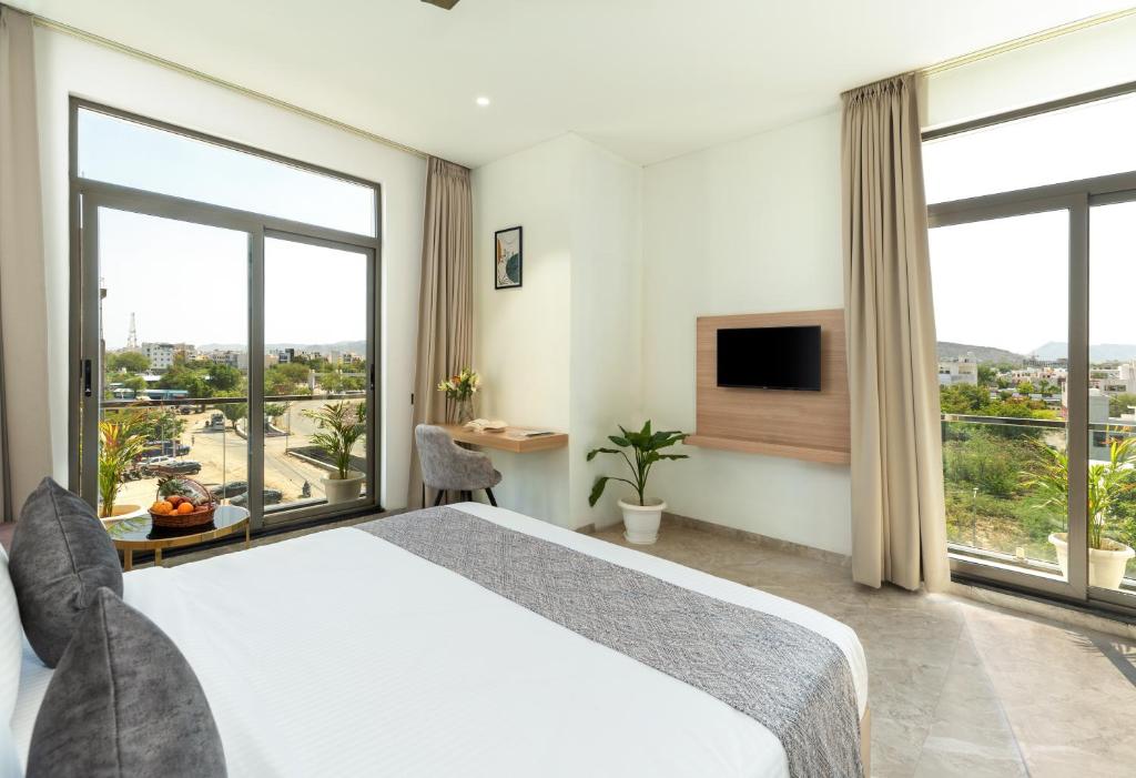 TV a/nebo společenská místnost v ubytování 7 rays hotel