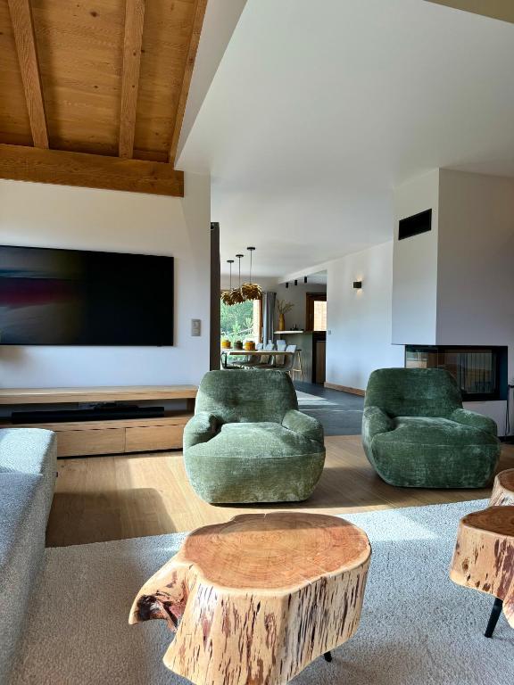 Posezení v ubytování Chalet du Feug