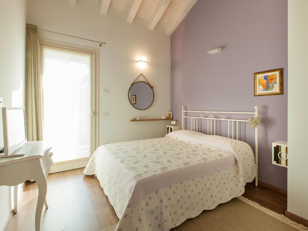 Posteľ alebo postele v izbe v ubytovaní B&B Cà Dea Calle