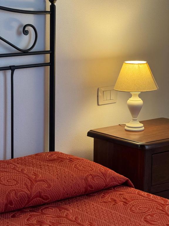 Postel nebo postele na pokoji v ubytování Affittacamere La Mattonata