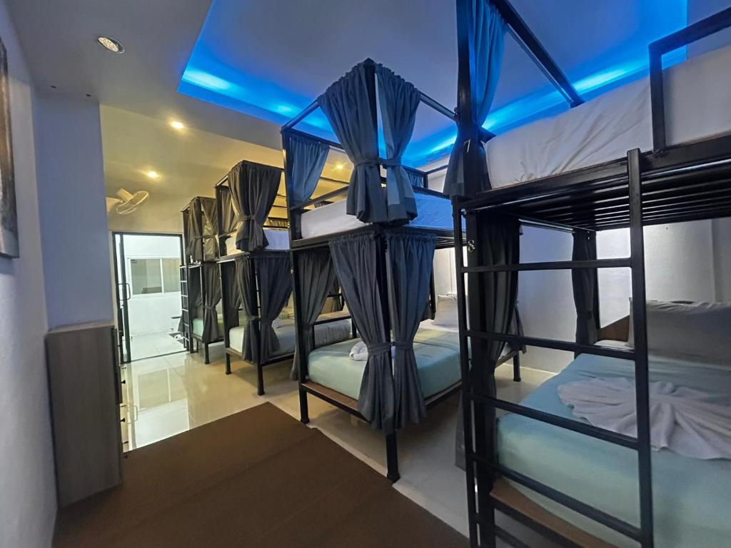 
Bed in Male Dormitory Room
