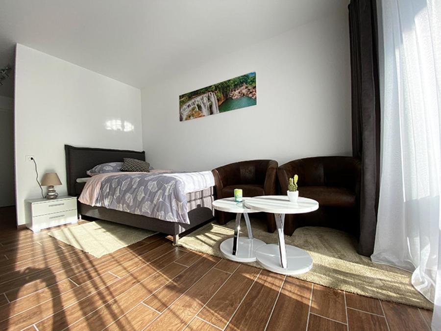 Postel nebo postele na pokoji v ubytování Aparthotel work&sleep