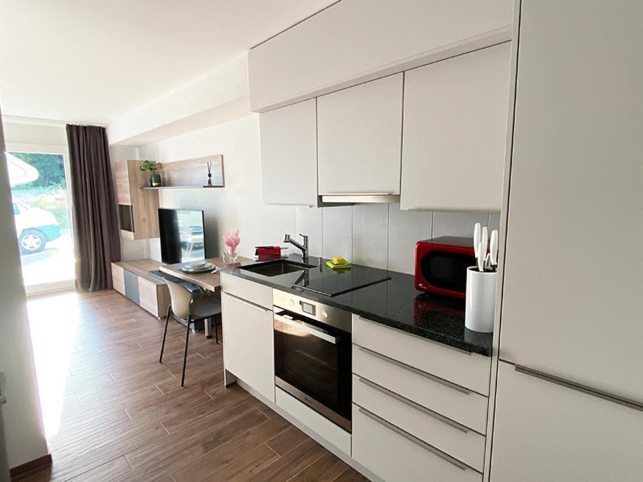 Kuchyň nebo kuchyňský kout v ubytování Aparthotel work&sleep