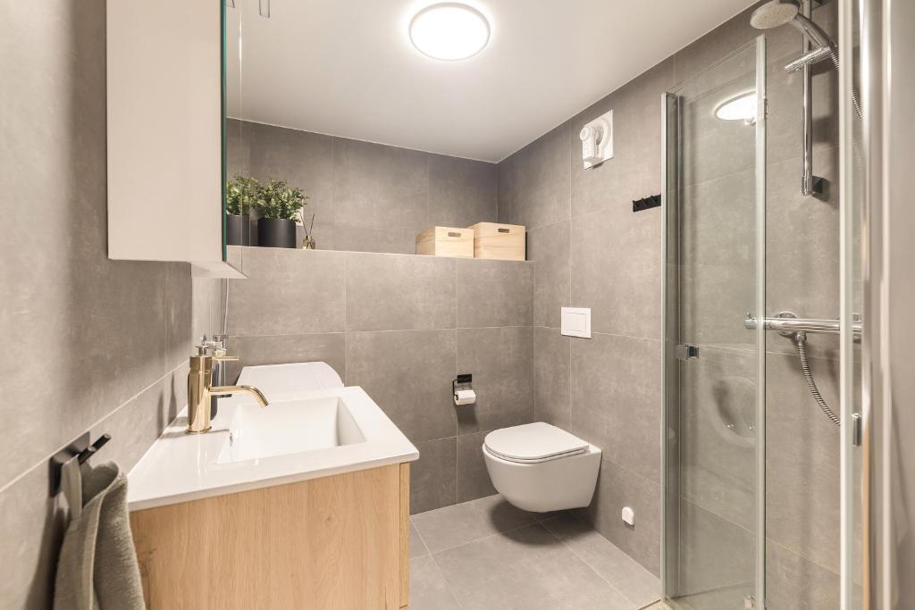 Ένα μπάνιο στο Central and modern apartment