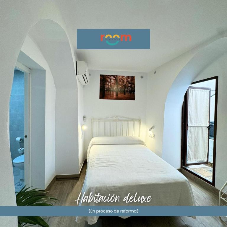 Cama o camas de una habitación en Belmonte Rooms
