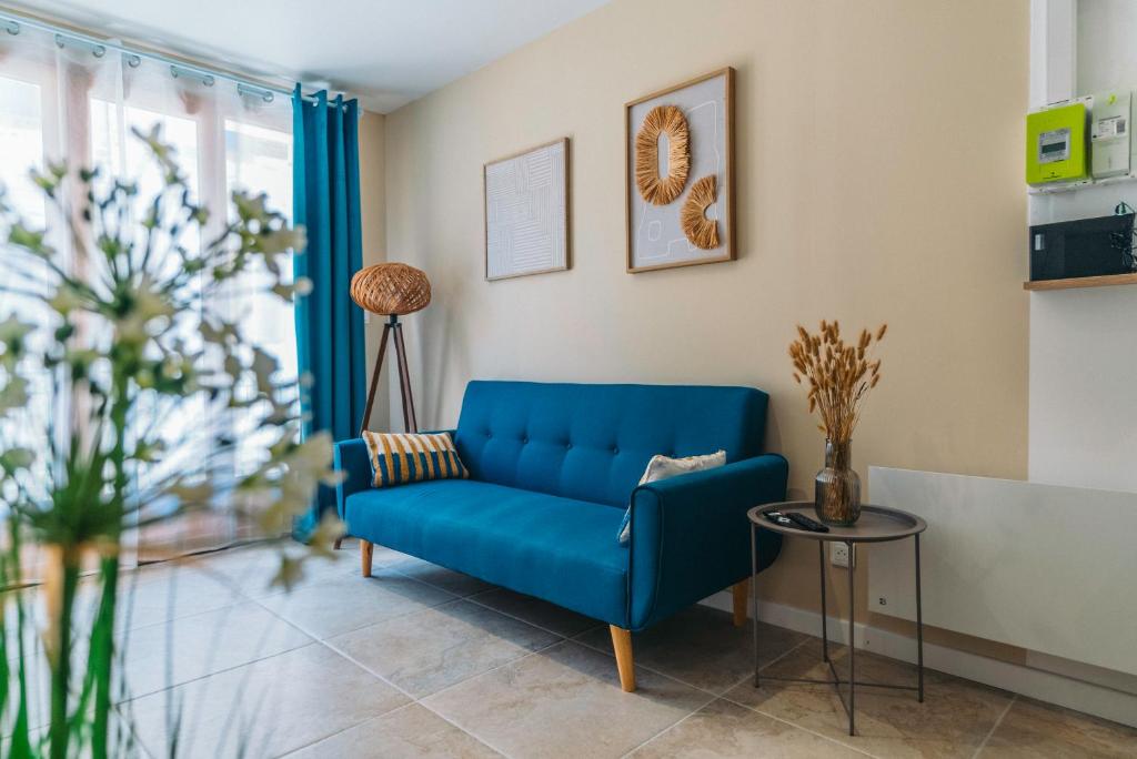Χώρος καθιστικού στο Bel appartement confortable et moderne