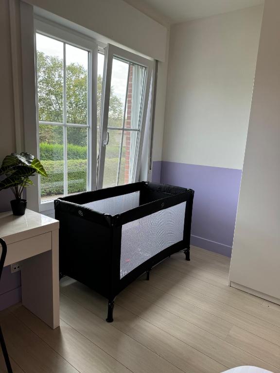 Postel nebo postele na pokoji v ubytování Nethehuis