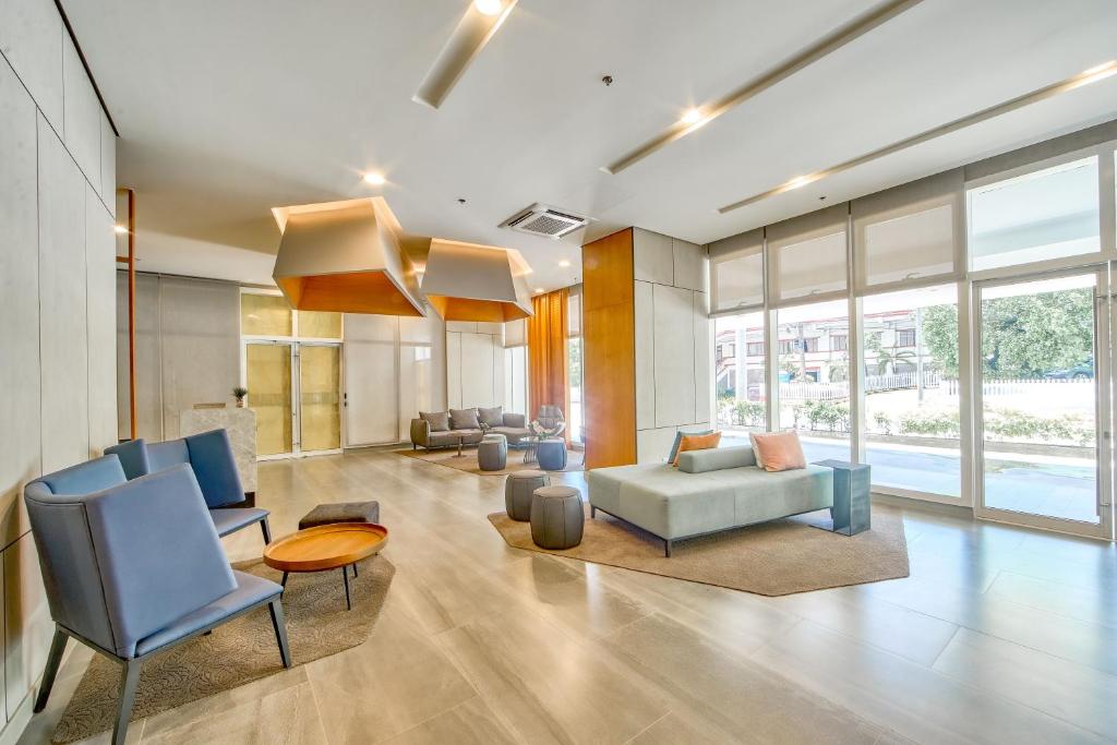 Posezení v ubytování The Connor Serviced Residences Managed by HII