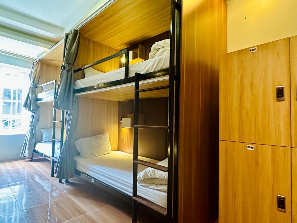 Postel nebo postele na pokoji v ubytování Hanoi Central Backpackers Hostel