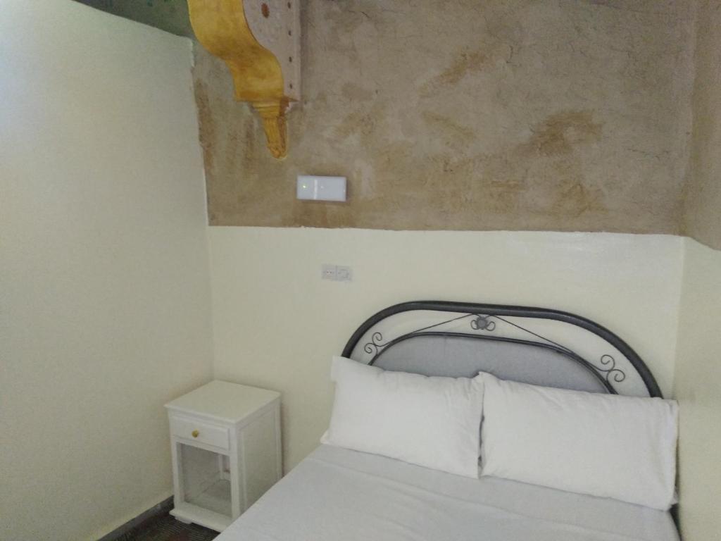 Postel nebo postele na pokoji v ubytování gîte d'étape ziz oasis