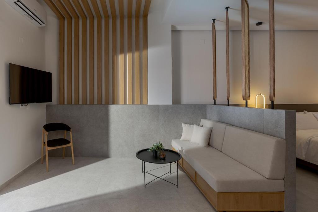 TV a/nebo společenská místnost v ubytování JM Suites by Estia