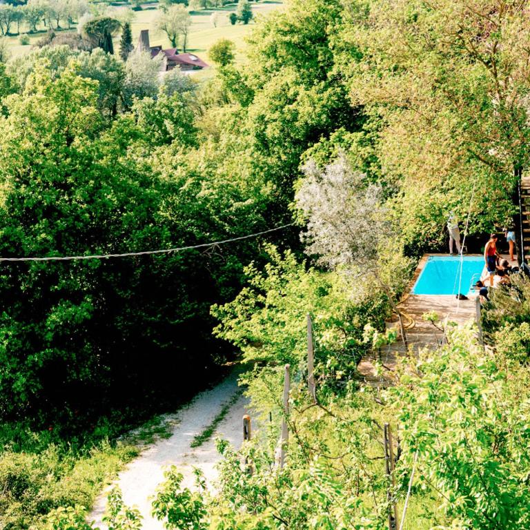 Bazén v ubytování Ostello Bello Assisi Bevagna nebo v jeho okolí