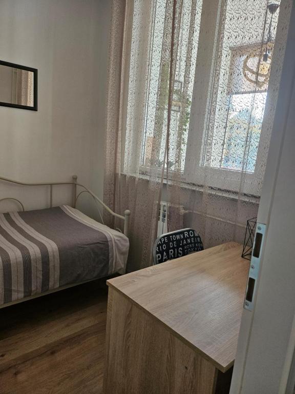 Posteľ alebo postele v izbe v ubytovaní Apartman "Stay In" Osijek