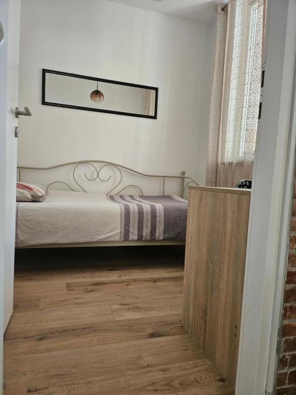 Posteľ alebo postele v izbe v ubytovaní Apartman "Stay In" Osijek