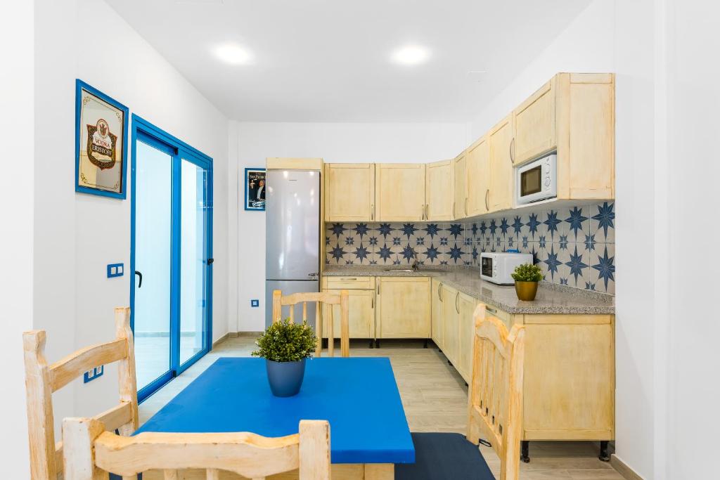 Kuchyň nebo kuchyňský kout v ubytování OKEANOS Eco Guest House
