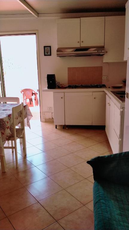 Kuchyň nebo kuchyňský kout v ubytování Villa Itaca