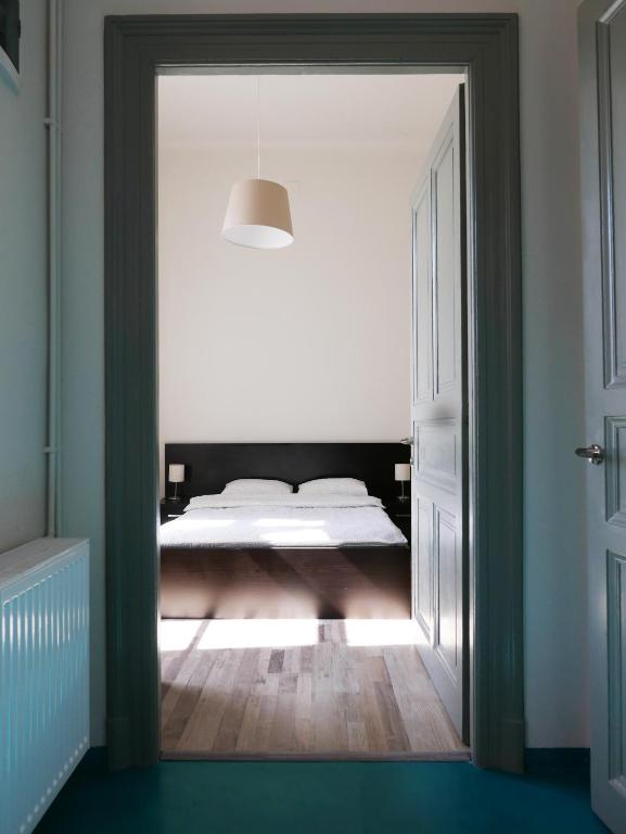 Postel nebo postele na pokoji v ubytování Choco Home & Hostel