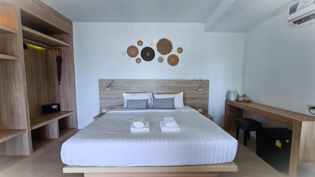 Postel nebo postele na pokoji v ubytování Moonlight Bay Resort