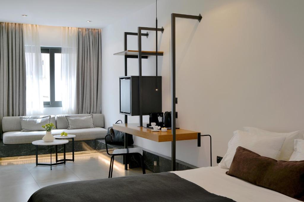 Postel nebo postele na pokoji v ubytování The Editor Hotel Athens