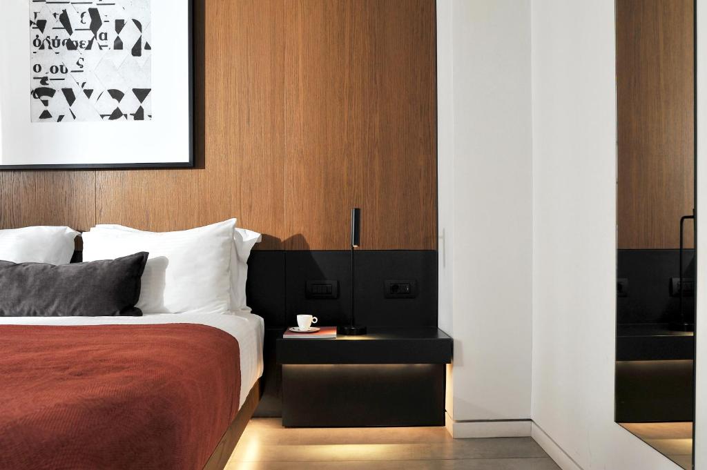 Postel nebo postele na pokoji v ubytování The Editor Hotel Athens
