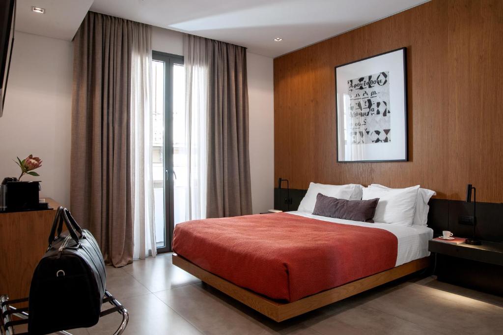 Postel nebo postele na pokoji v ubytování The Editor Hotel Athens