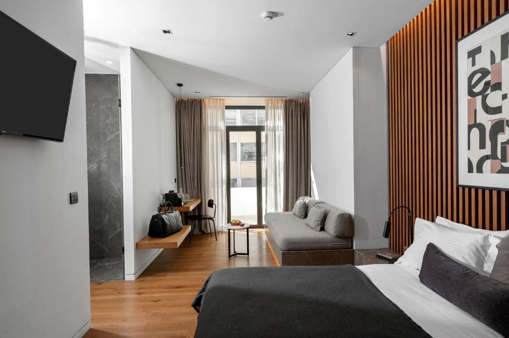 Postel nebo postele na pokoji v ubytování The Editor Hotel Athens