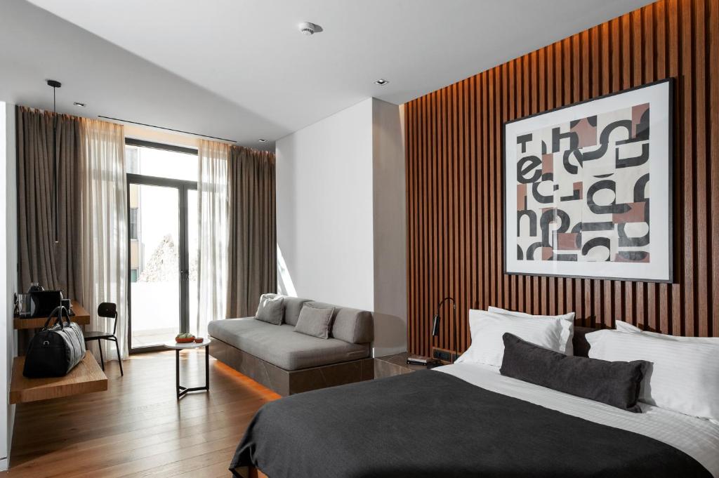 Postel nebo postele na pokoji v ubytování The Editor Hotel Athens