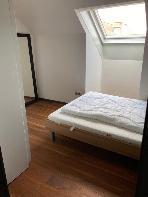 Postel nebo postele na pokoji v ubytování Sonnig zentral gelegene Wohnung