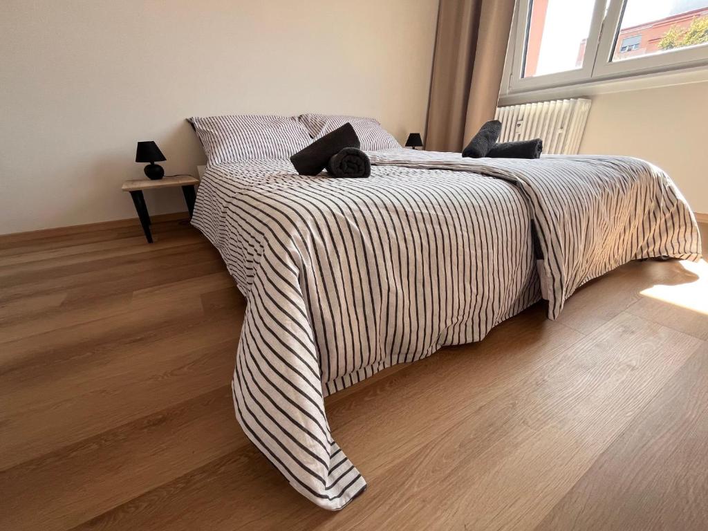 Postel nebo postele na pokoji v ubytování Apartmán Šumava