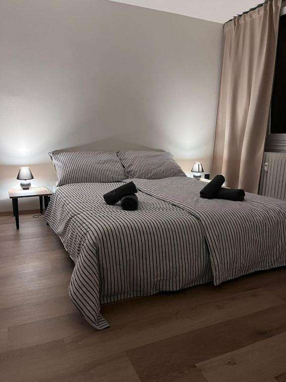 Postel nebo postele na pokoji v ubytování Apartmán Šumava