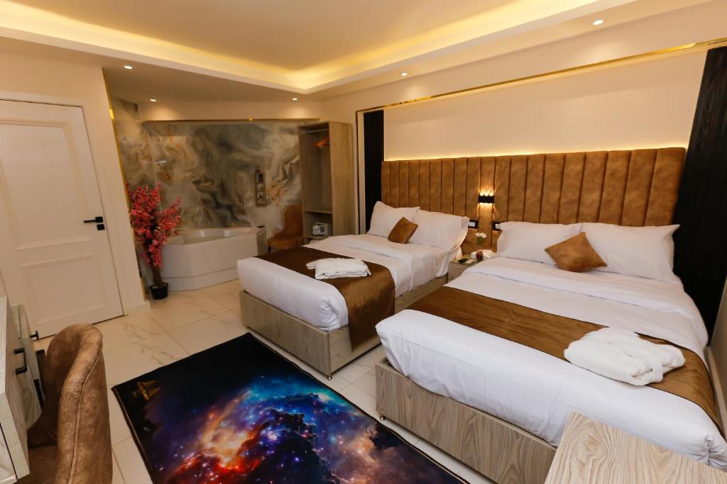 Katil atau katil-katil dalam bilik di Horizon Pyramid View INN