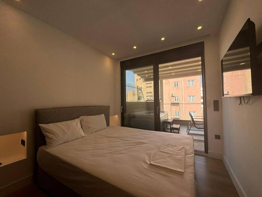 Postel nebo postele na pokoji v ubytování BlueMotion - PortSuite 4A