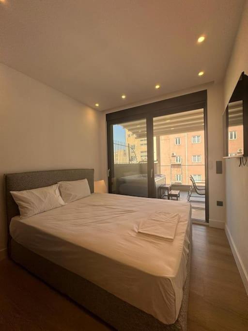 Postel nebo postele na pokoji v ubytování BlueMotion - PortSuite 4A