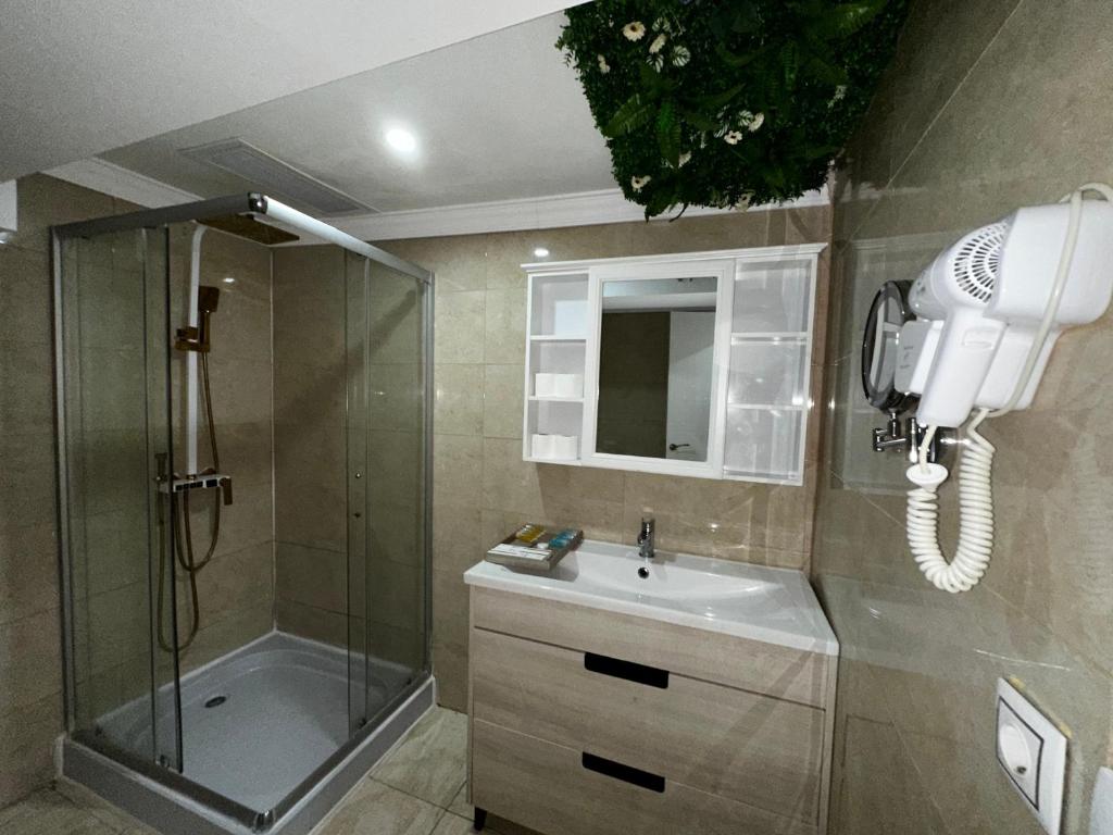 Koupelna v ubytování HOTEL AVIACIOn