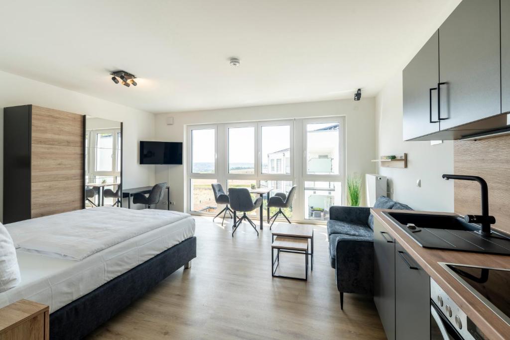 Nhà bếp/bếp nhỏ tại VR-Serviced Apartments Würzburg