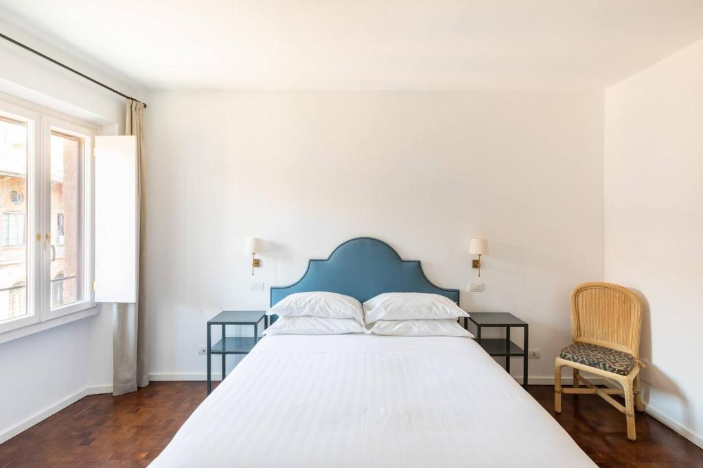 Łóżko lub łóżka w pokoju w obiekcie Residenza Torre Vecchiarelli - apt 4