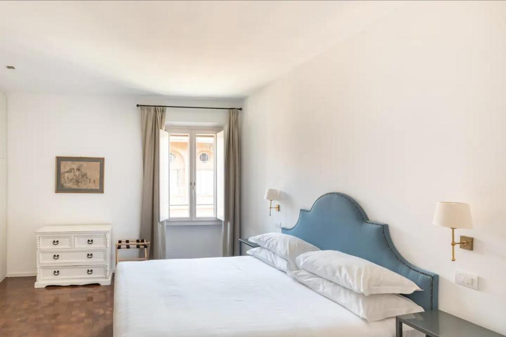 Łóżko lub łóżka w pokoju w obiekcie Residenza Torre Vecchiarelli - apt 4