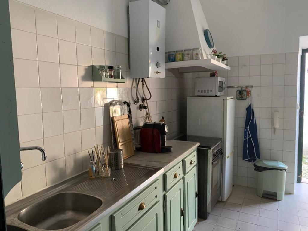 Køkken eller tekøkken på Santuário SOS Animal