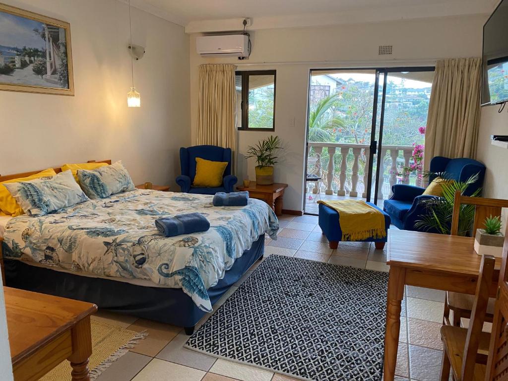 a bedroom with a bed and a living room at Crayfish Inn no6 in Ramsgate