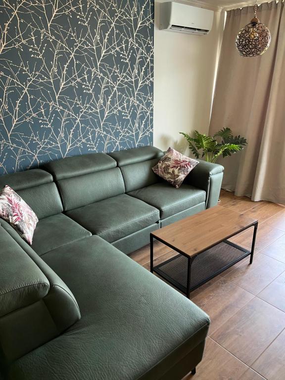 A seating area at Sun Wave Apartment Presige