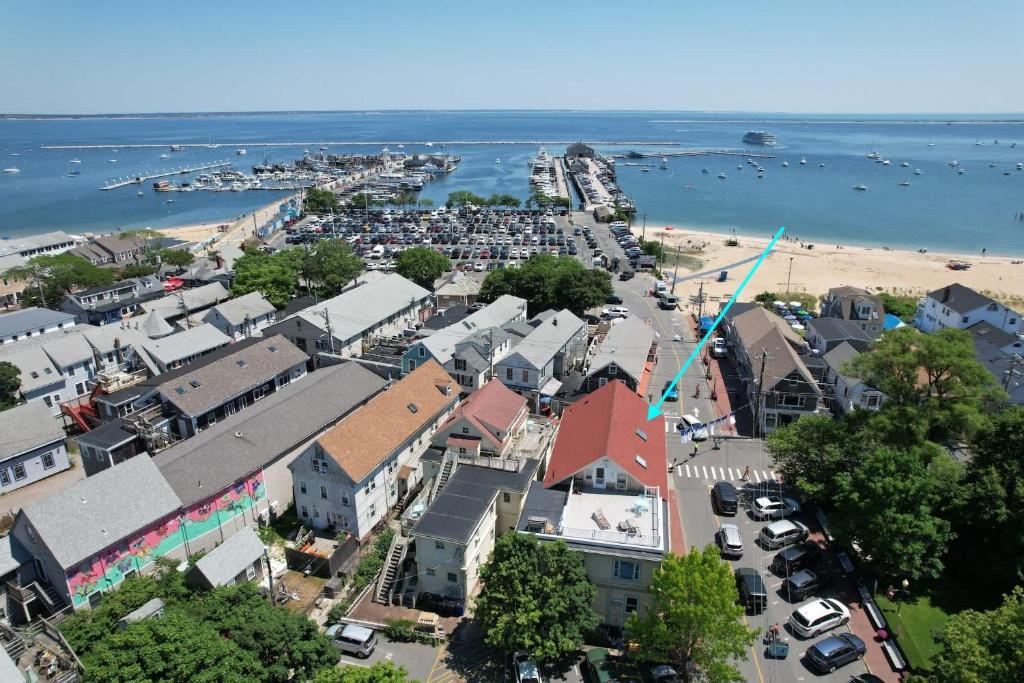 an aerial view of a town with a beach at Cozy Retreat on Commercial Street for 2 in Provincetown