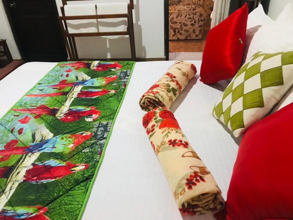 Postel nebo postele na pokoji v ubytování Laaya Kandy