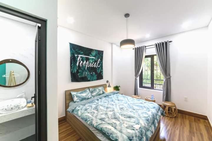 Postel nebo postele na pokoji v ubytování Kivi Homestay Hoi An