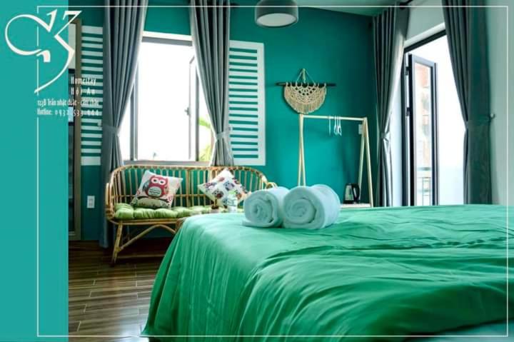 Postel nebo postele na pokoji v ubytování Kivi Homestay Hoi An