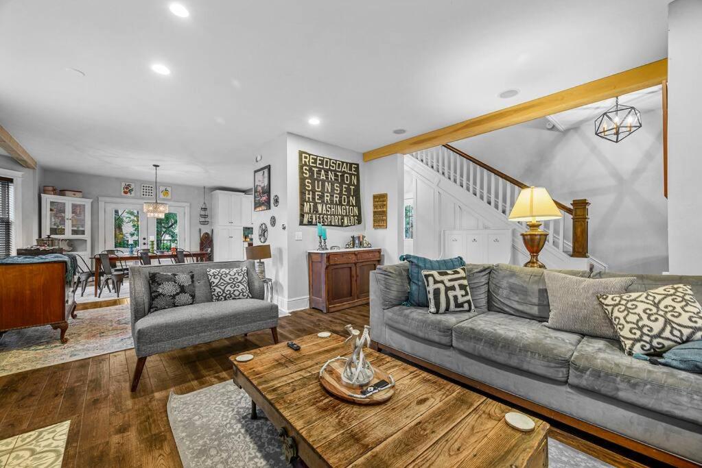 a living room with a couch and a table at Fantastic Family Home in Central Mount Washington in Pittsburgh
