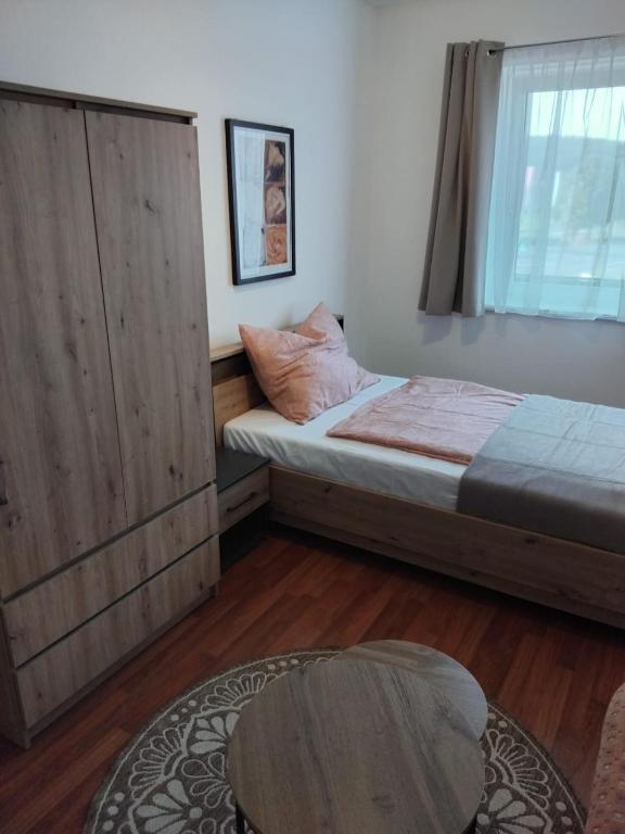Postel nebo postele na pokoji v ubytování Apartment Fasching