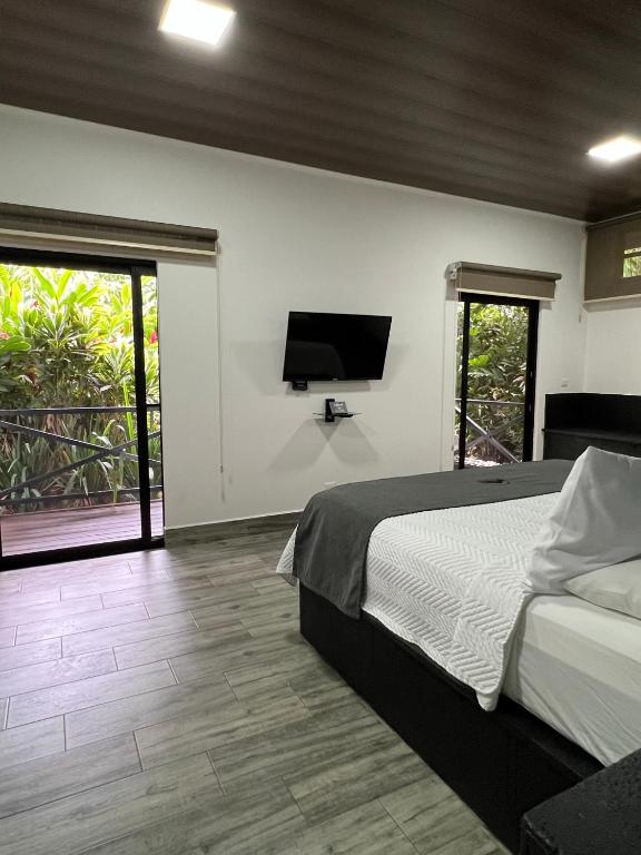 Postel nebo postele na pokoji v ubytování Hotel Boutique Casa Del Rio