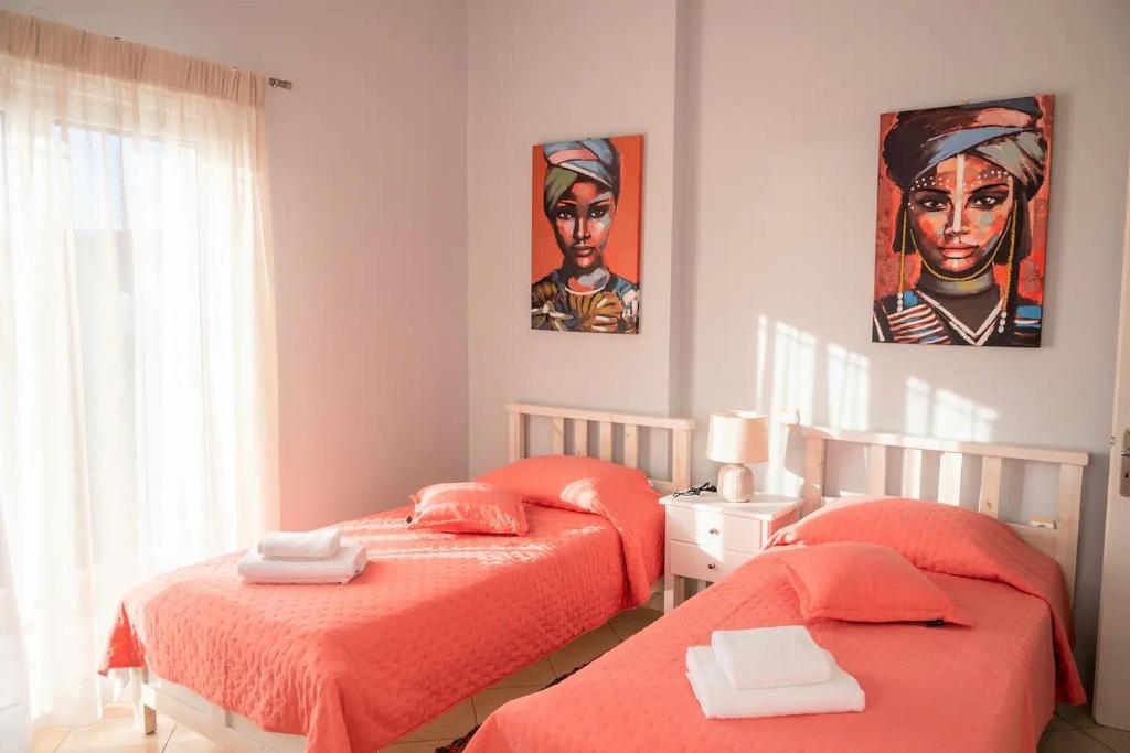 Postel nebo postele na pokoji v ubytování Elenas Villas